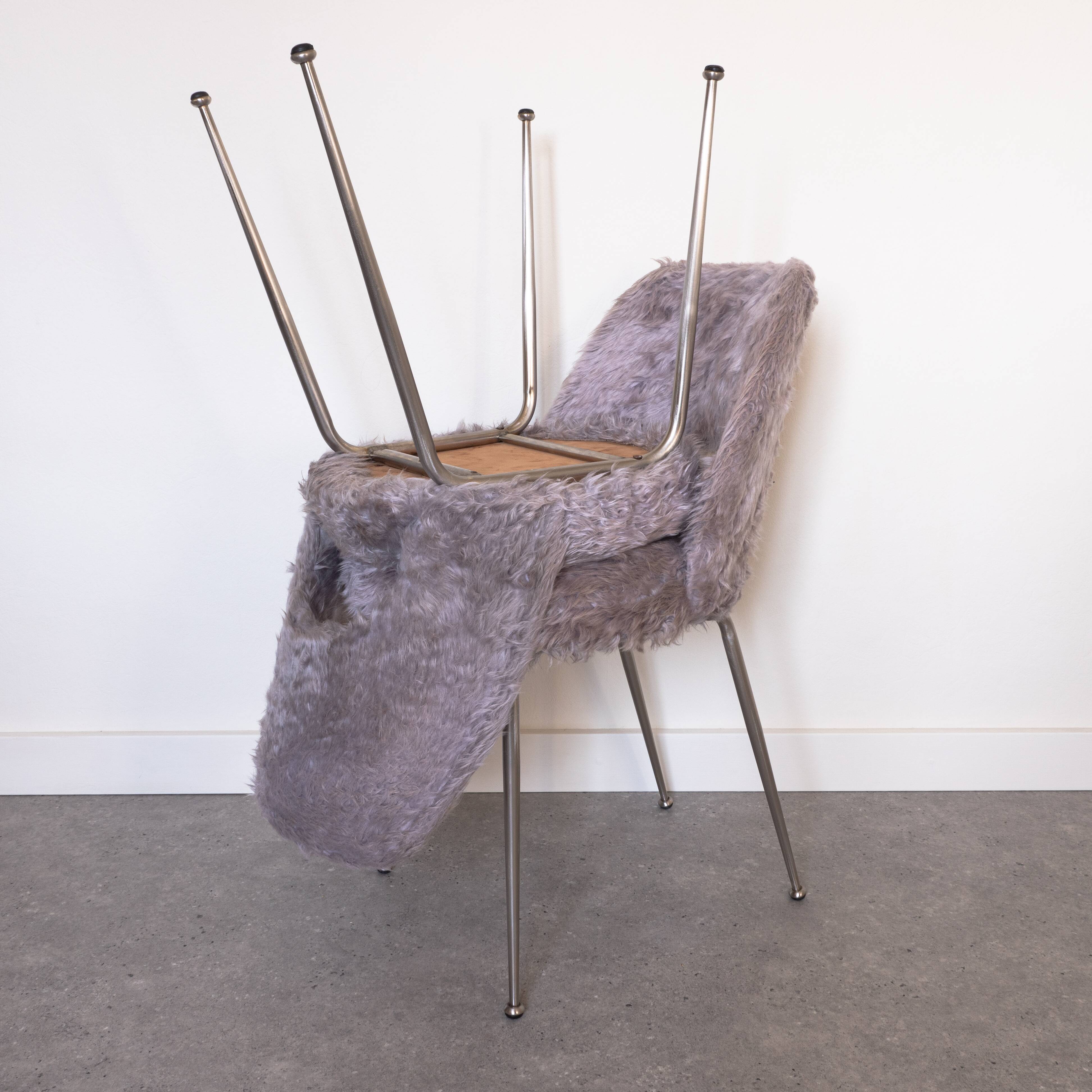 Pair of grey moumoute chairs