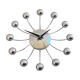 Chrome Karlsson spider wall clock with black hands, sputnik space age