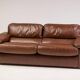 Royal 2-seater canapé premium Poltrona Frau Petronio upholstered in down and chestnut leather.