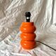 Orange glazed ceramic lamp base - 1970s
