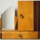 Asymmetrical art deco wall cabinet, drawer & mirror