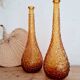 Pair of Italian Empoli vases in amber bubbled glass