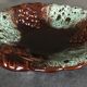 Ceramic fruit bowl centrepiece with grape cluster decoration, numbered.