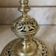 pair of openwork gilded brass candlesticks from the 19th century