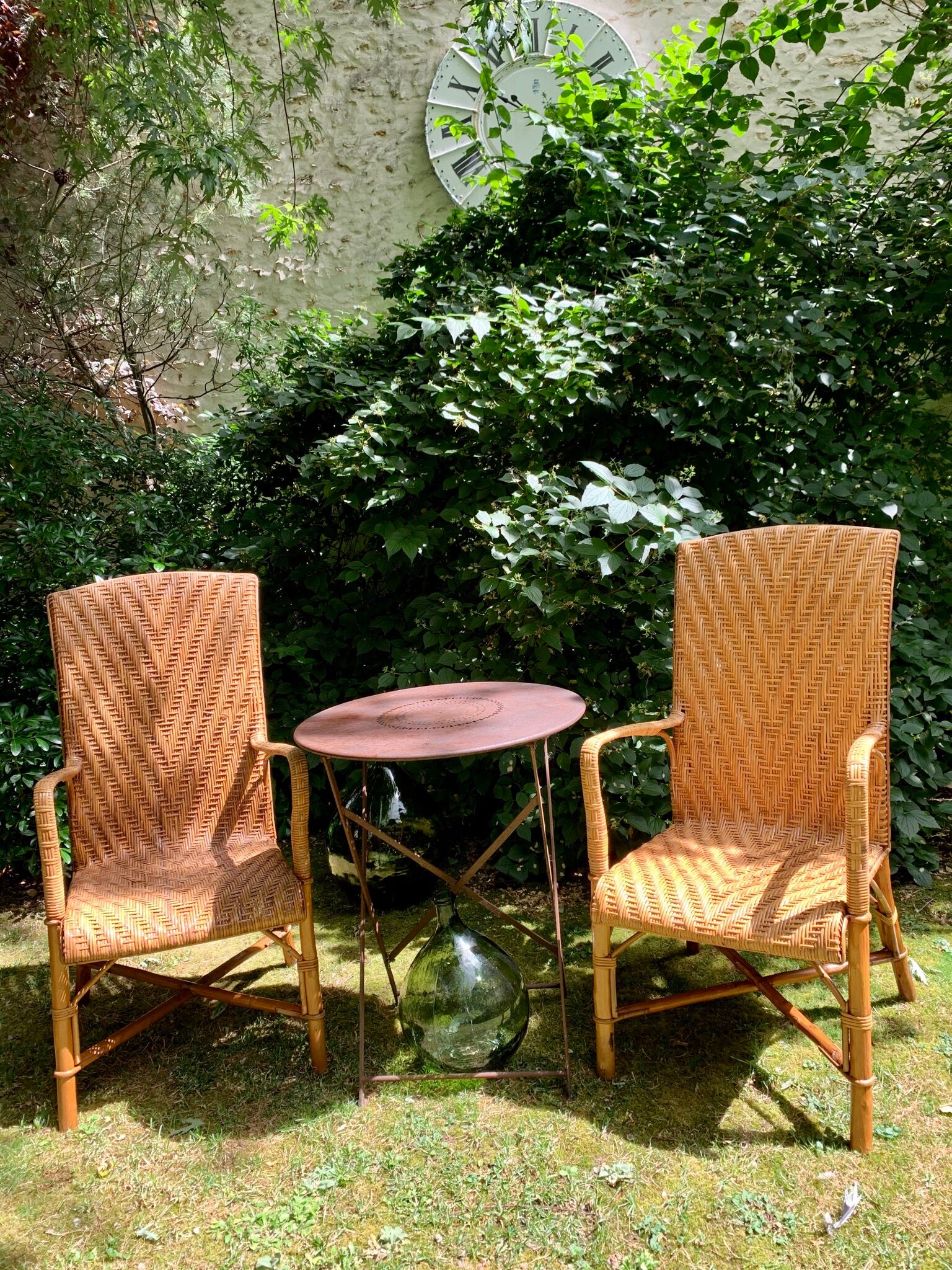 Pair of rattan armchairs
