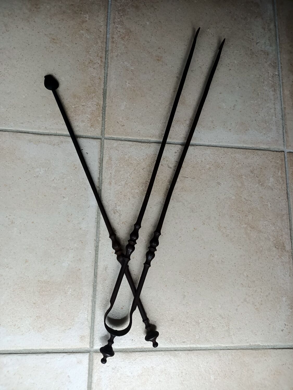 Tisonnier en fer forgé début XIXe
