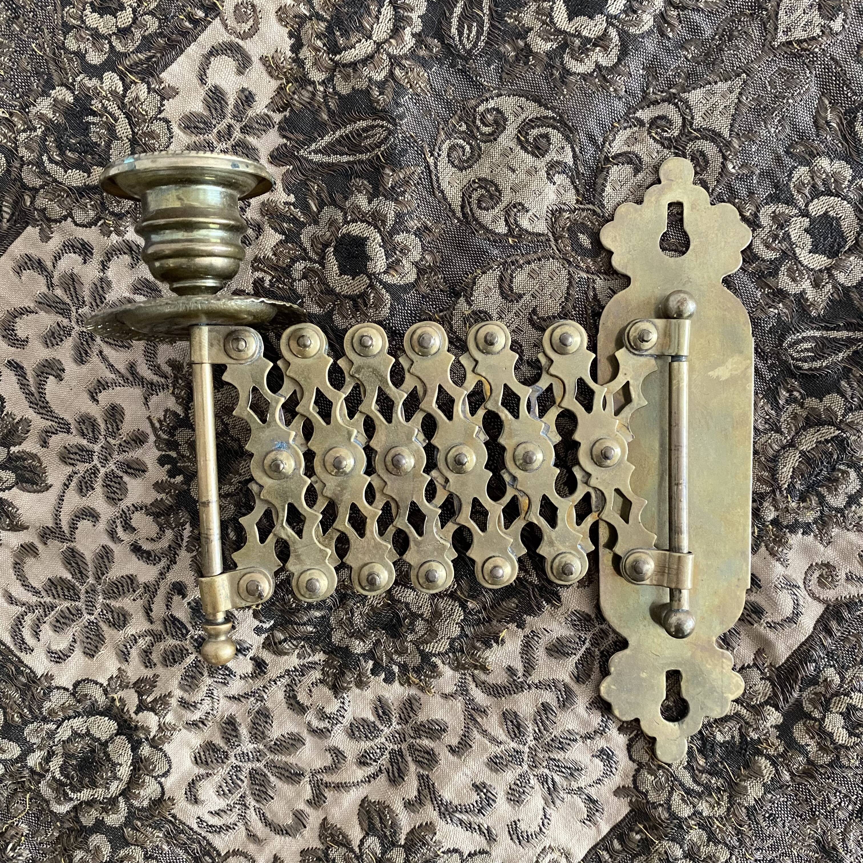 Antique extendable brass wall sconce