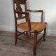 Straw armchair folk art.