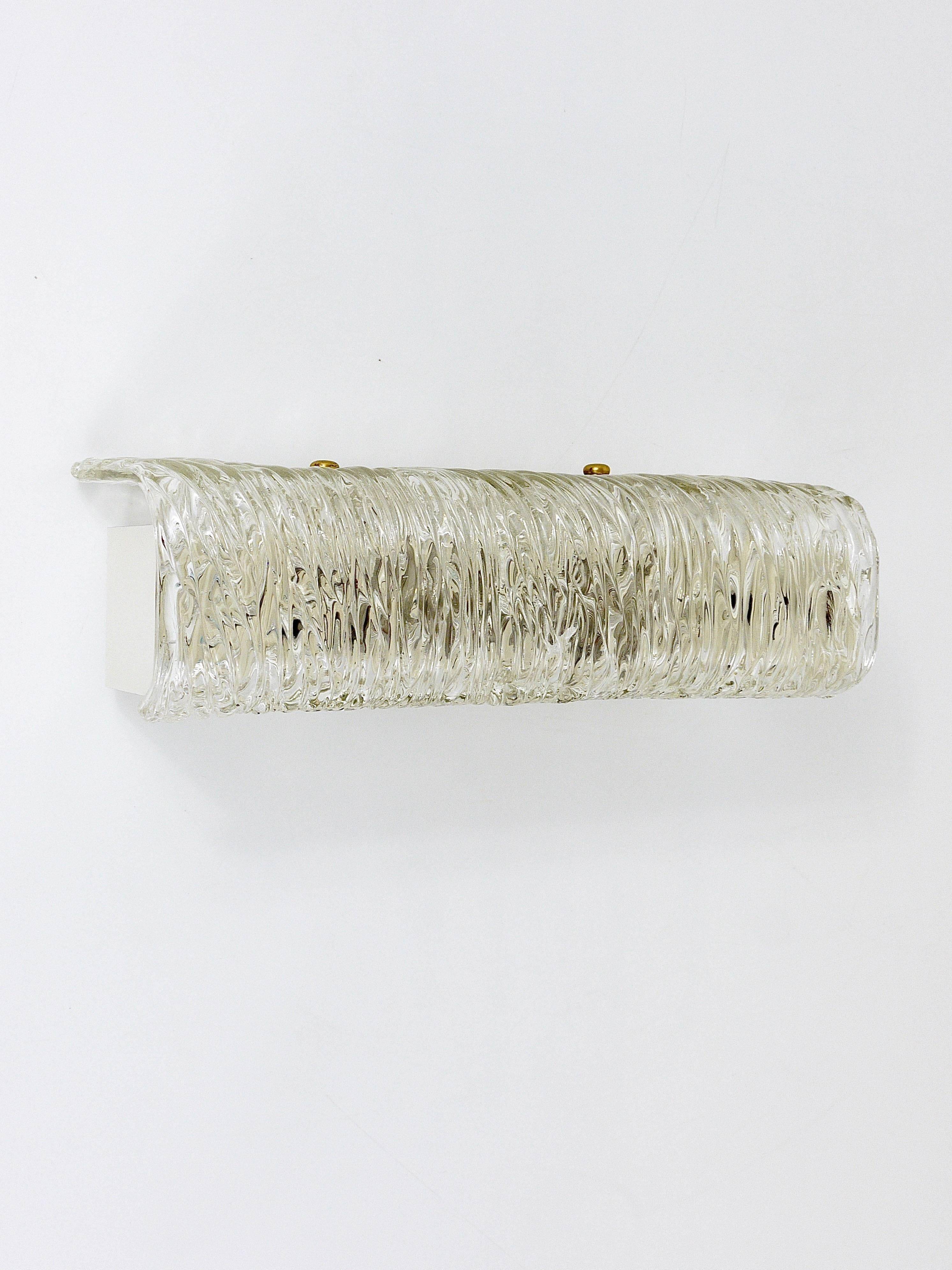 Wall-mounted mirror sconce by J.T. Kalmar, brass and textured glass, Austria, 1950s.