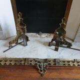 Chenêts and chimney bar in bronze nineteenth century.