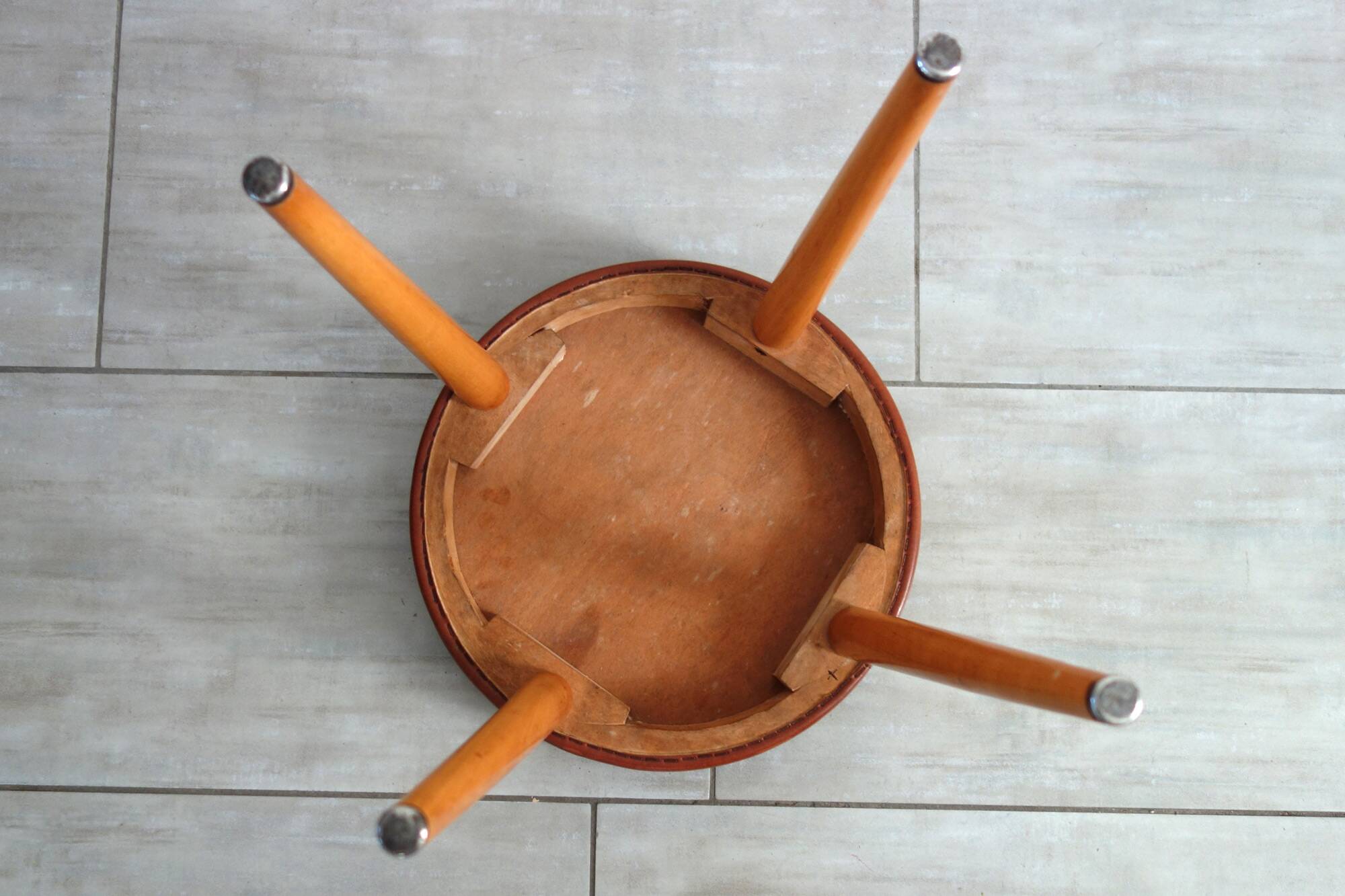 Baumann low stool from the 60s in brown leatherette