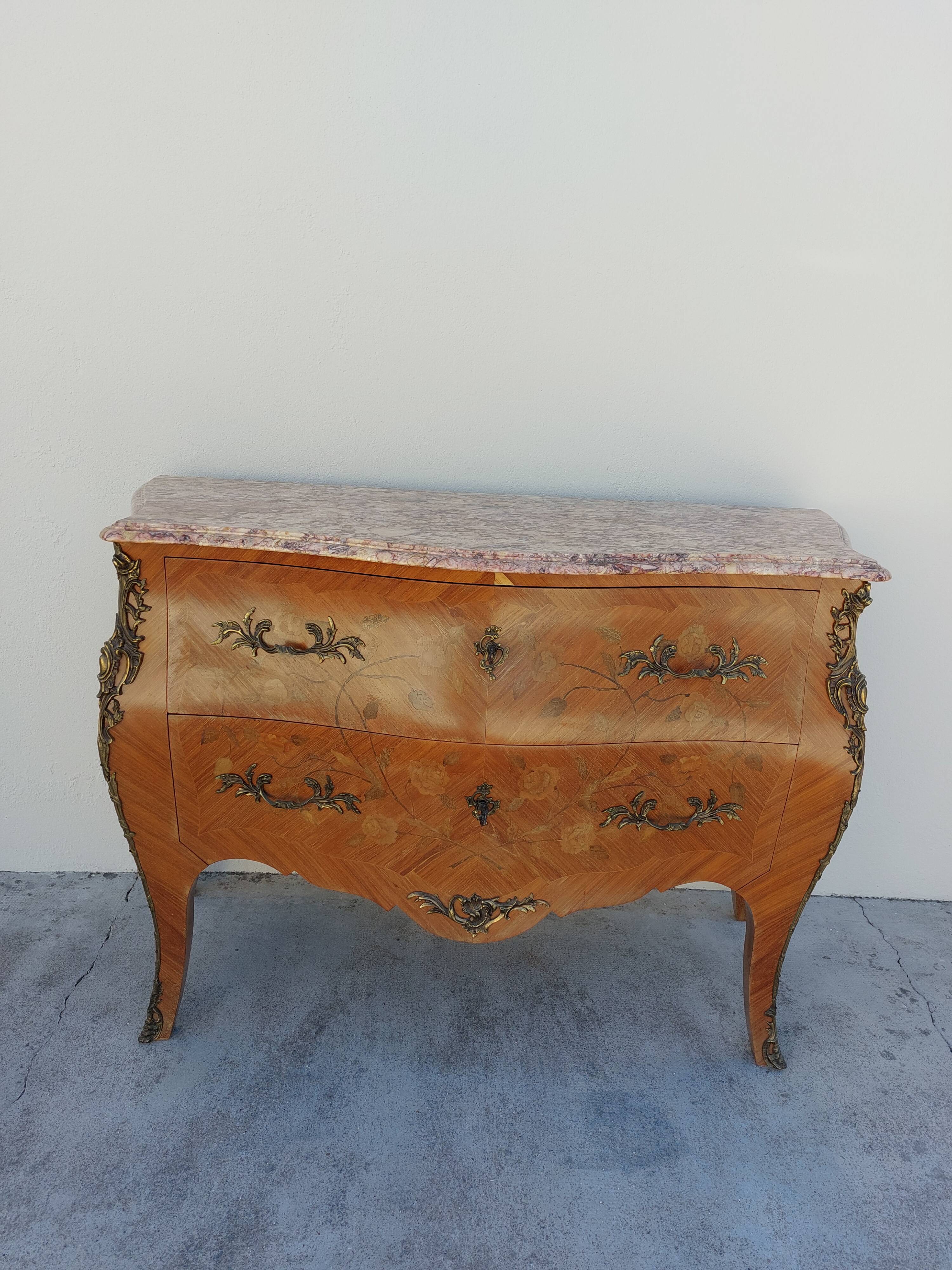 Louis XV chest of drawers in rosewood marquetry