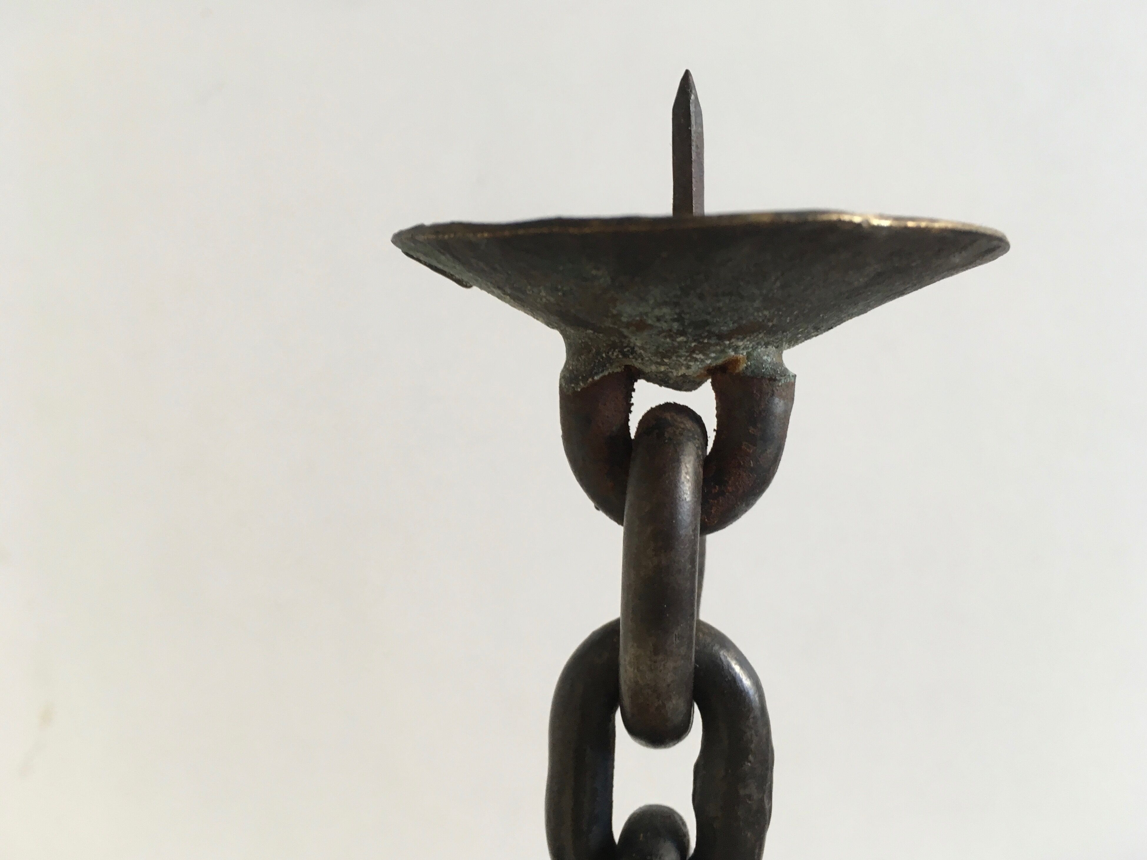 Candlestick with iron link chain and bronze cup
