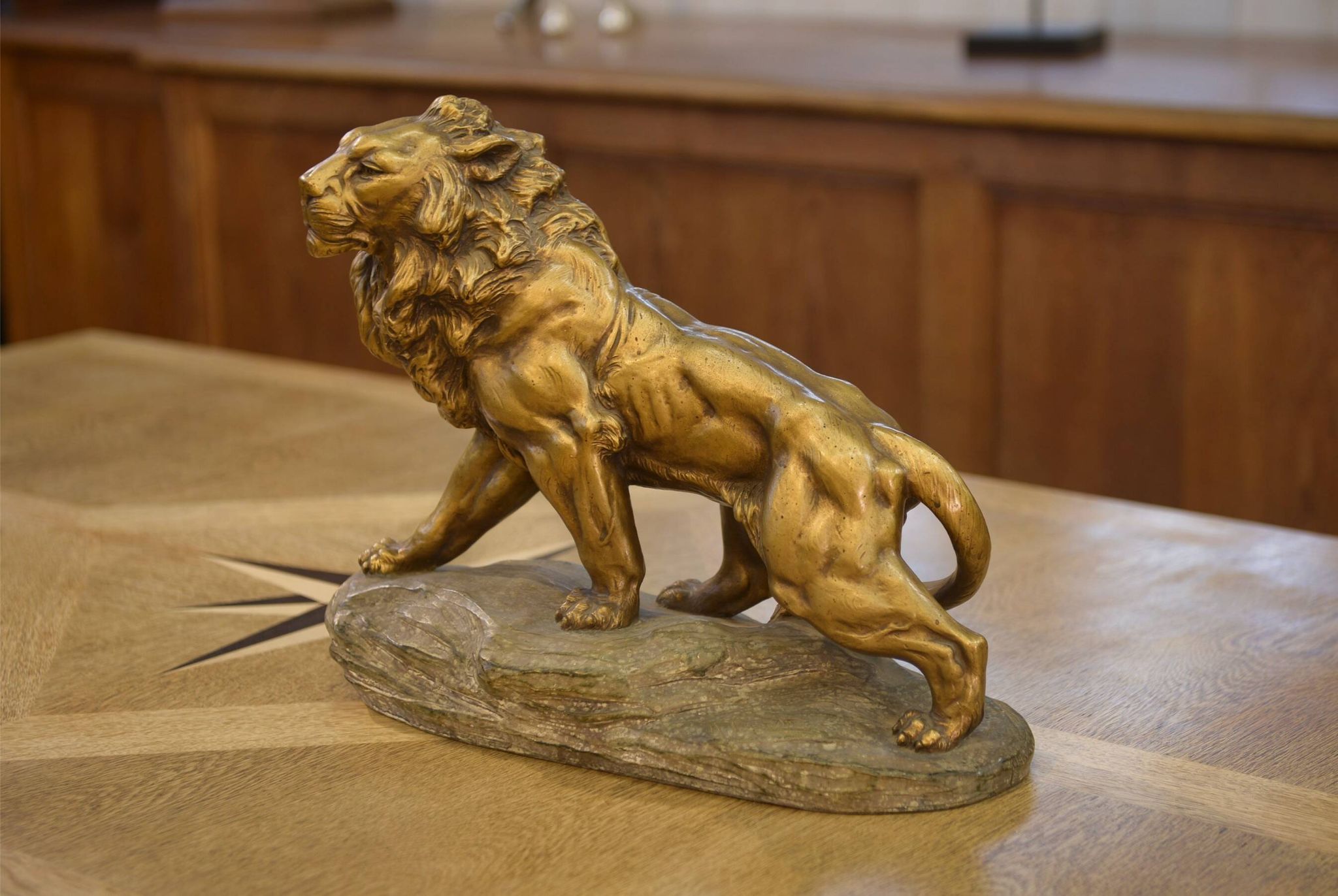 Sculpture of a lion in patinated terracotta by A. Fagotto, 1930s.