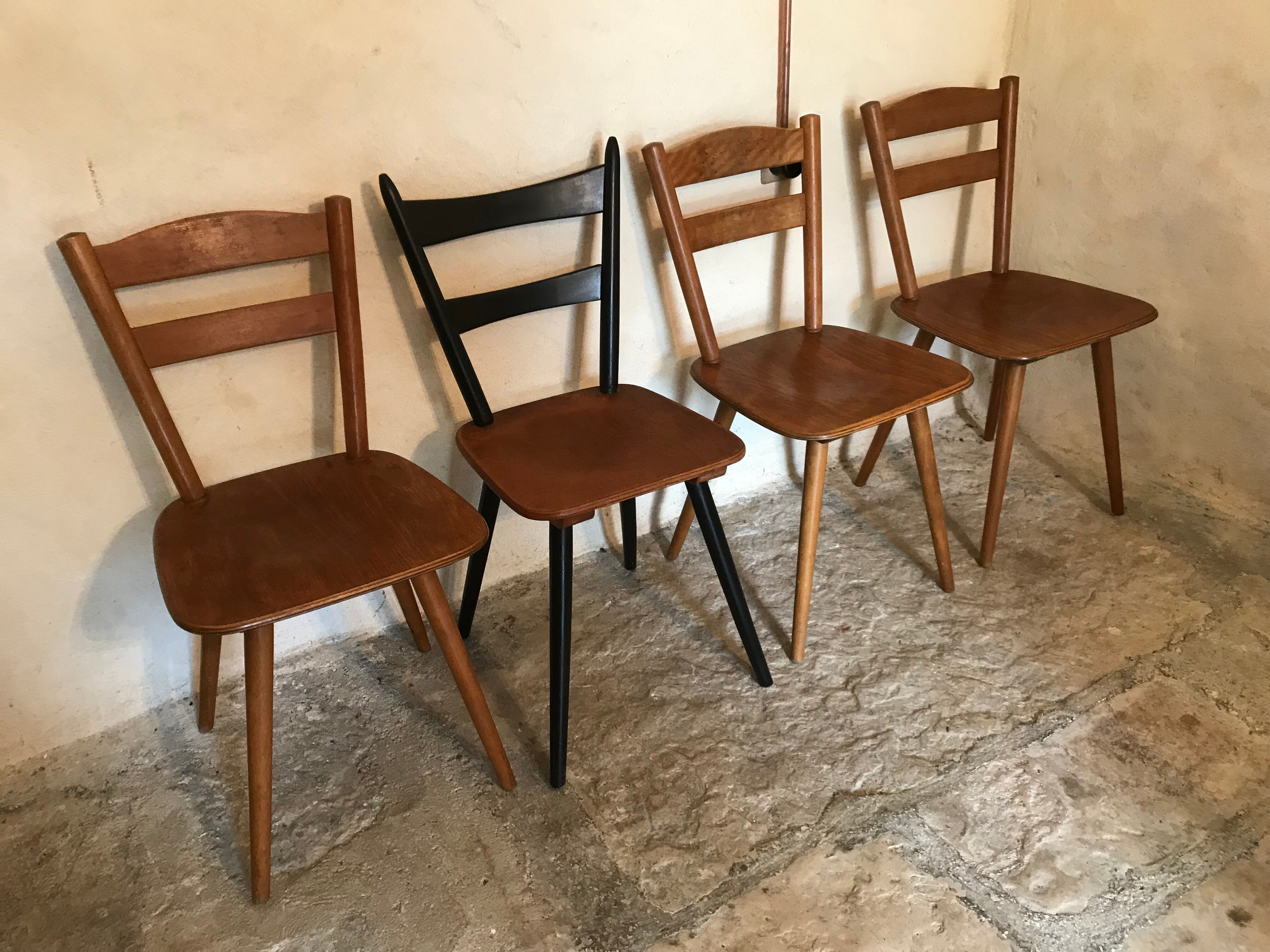 Set of 4 mismatched vintage chairs compass legs