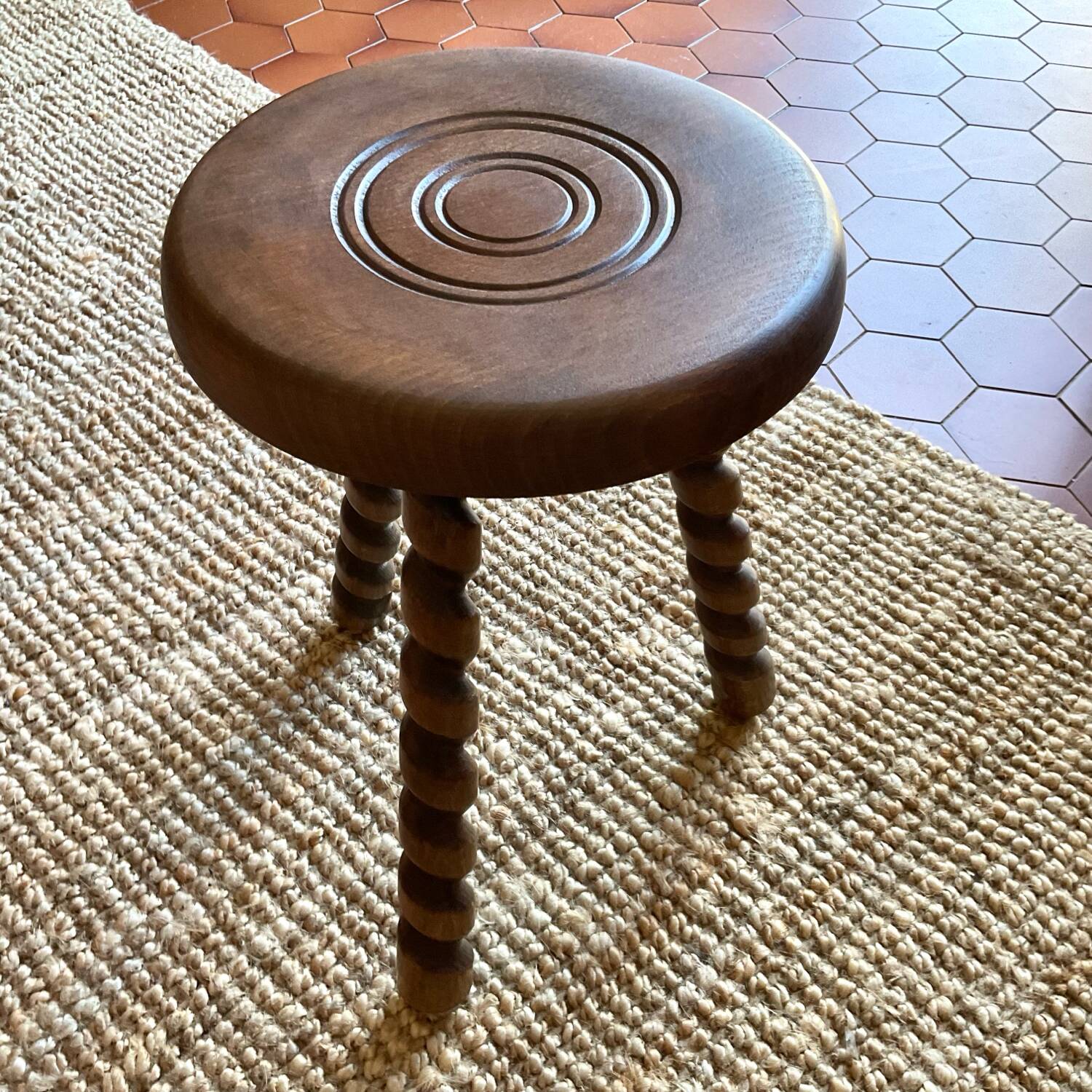 Tripod stool with turned legs