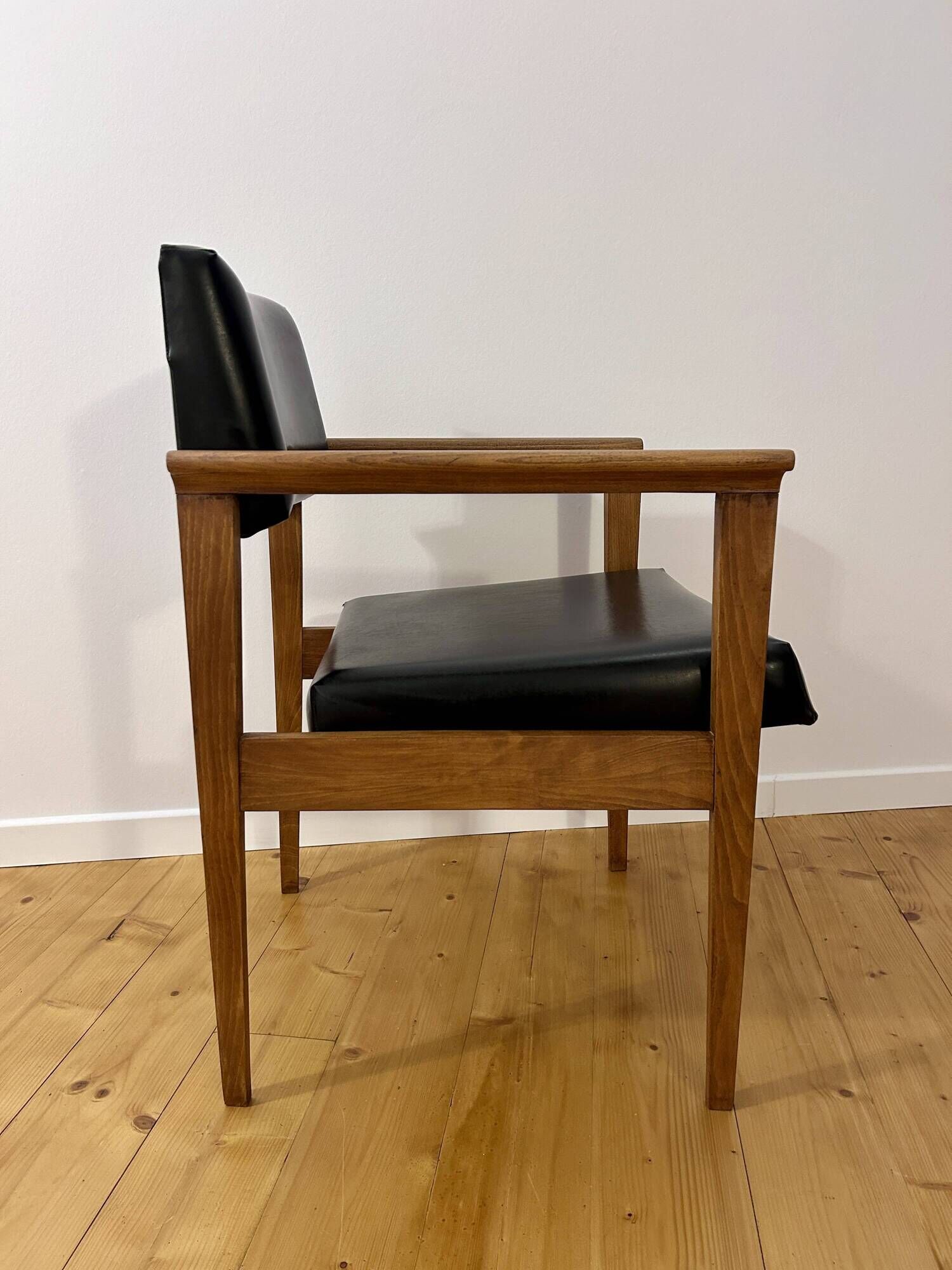 Mid-Century faux leather and wood armchair