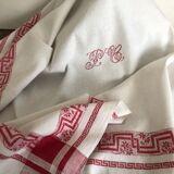 Ancient damask tablecloth with monogram