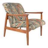 Scandinavian style armchair with terracotta patterns