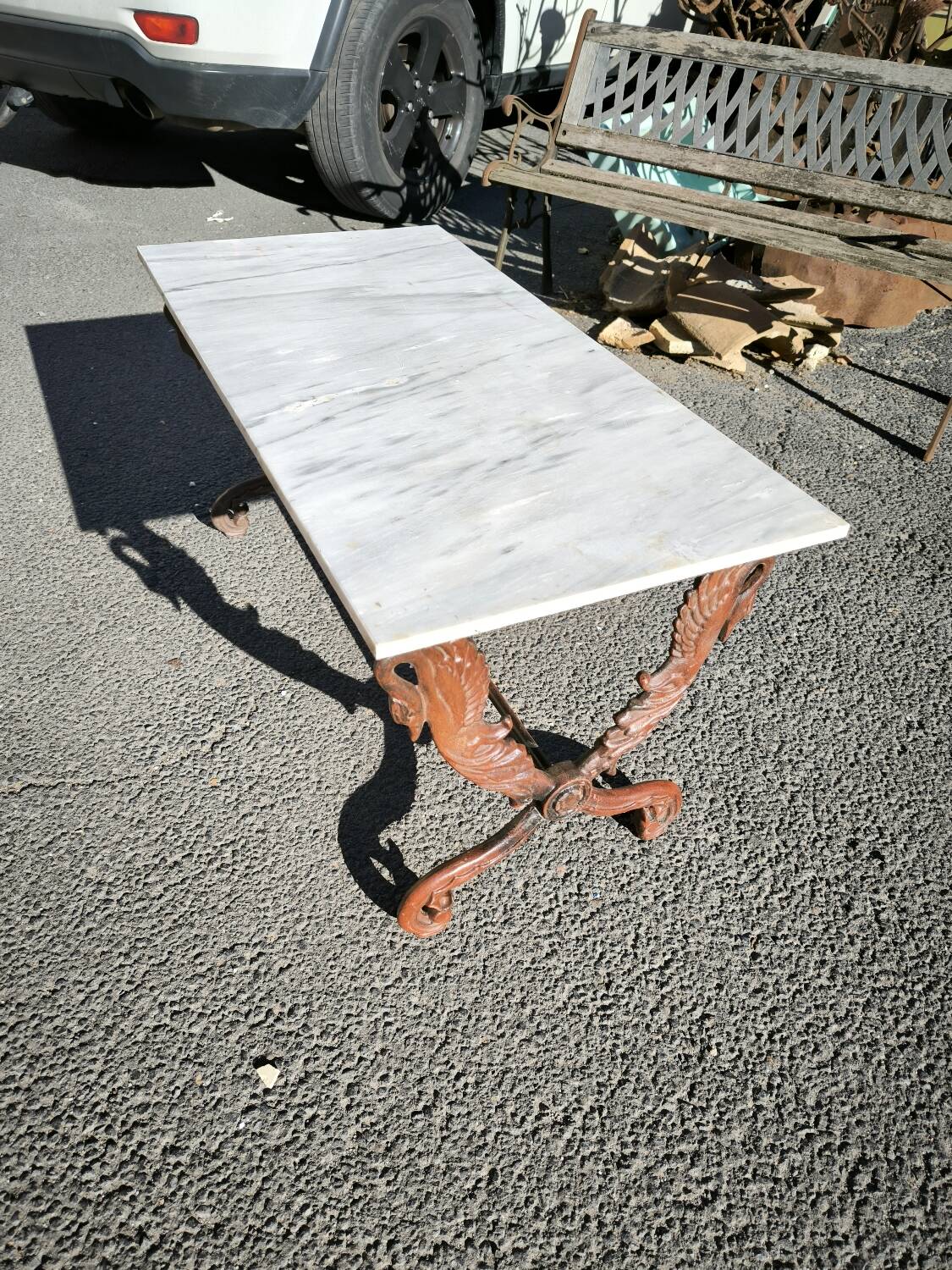 Cast iron and marble swan-neck coffee table