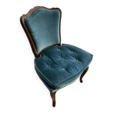Armchair in walnut and blue velvet