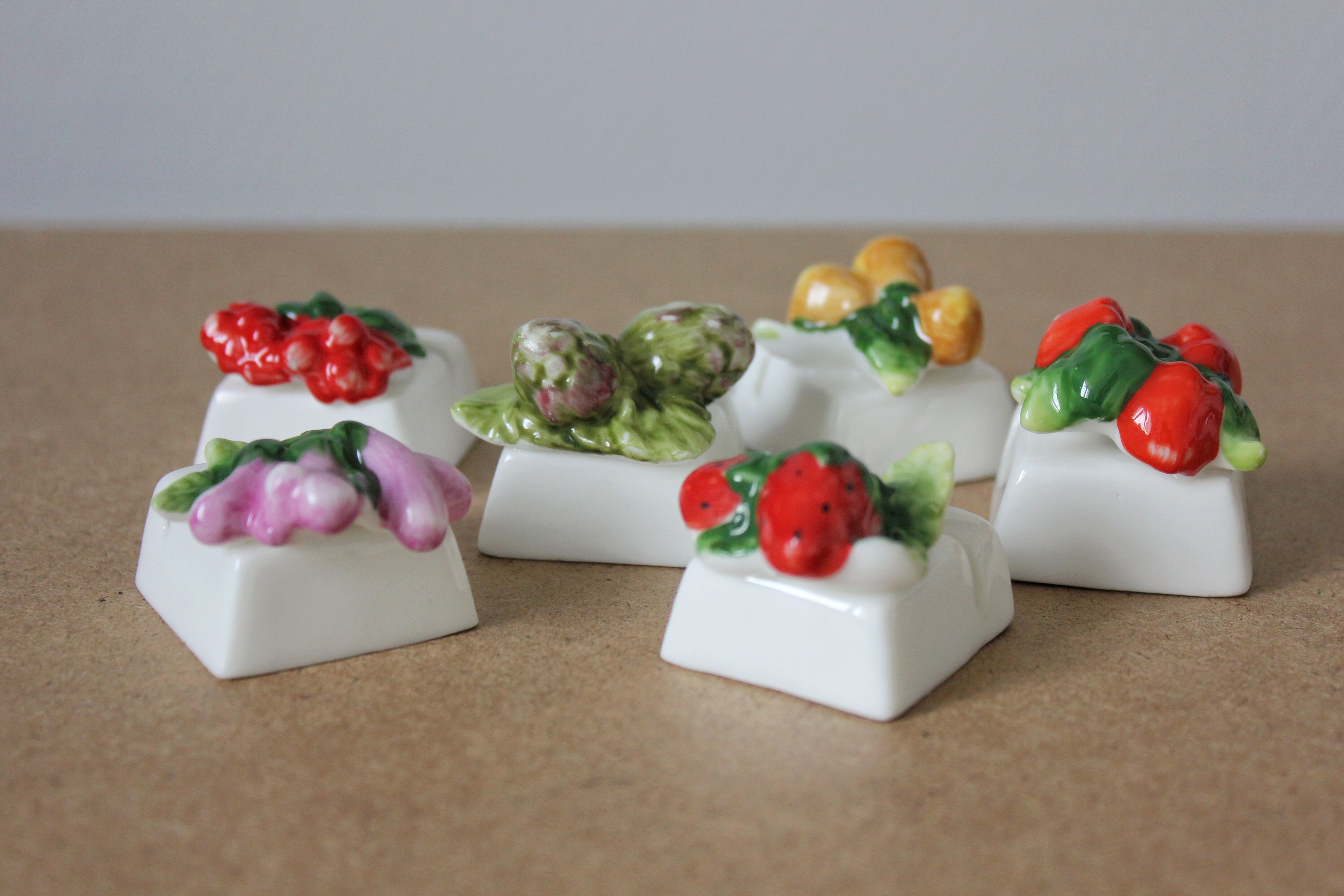 6 vintage fruit and vegetable-themed porcelain name tags in barbotine