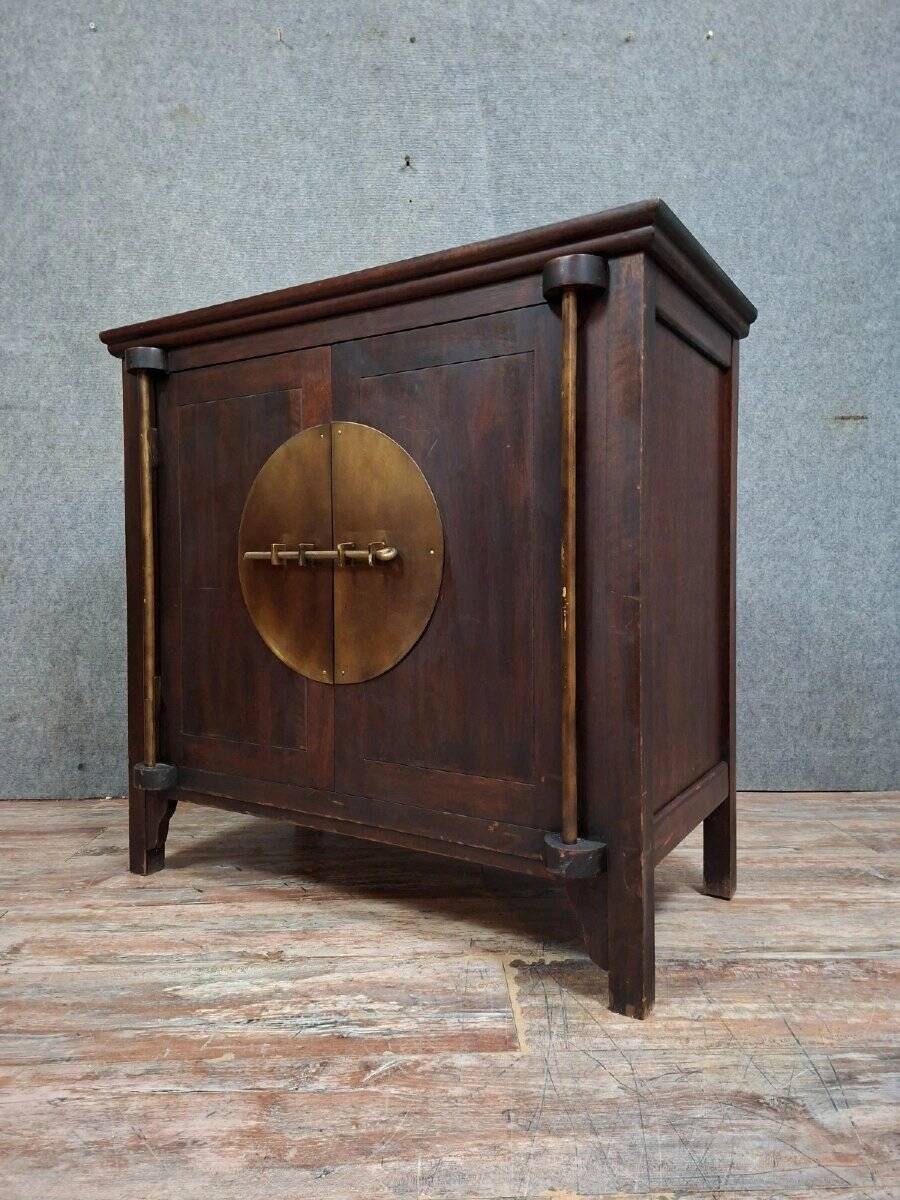 Buffet / antique Chinese wooden cabinet with brass fittings.