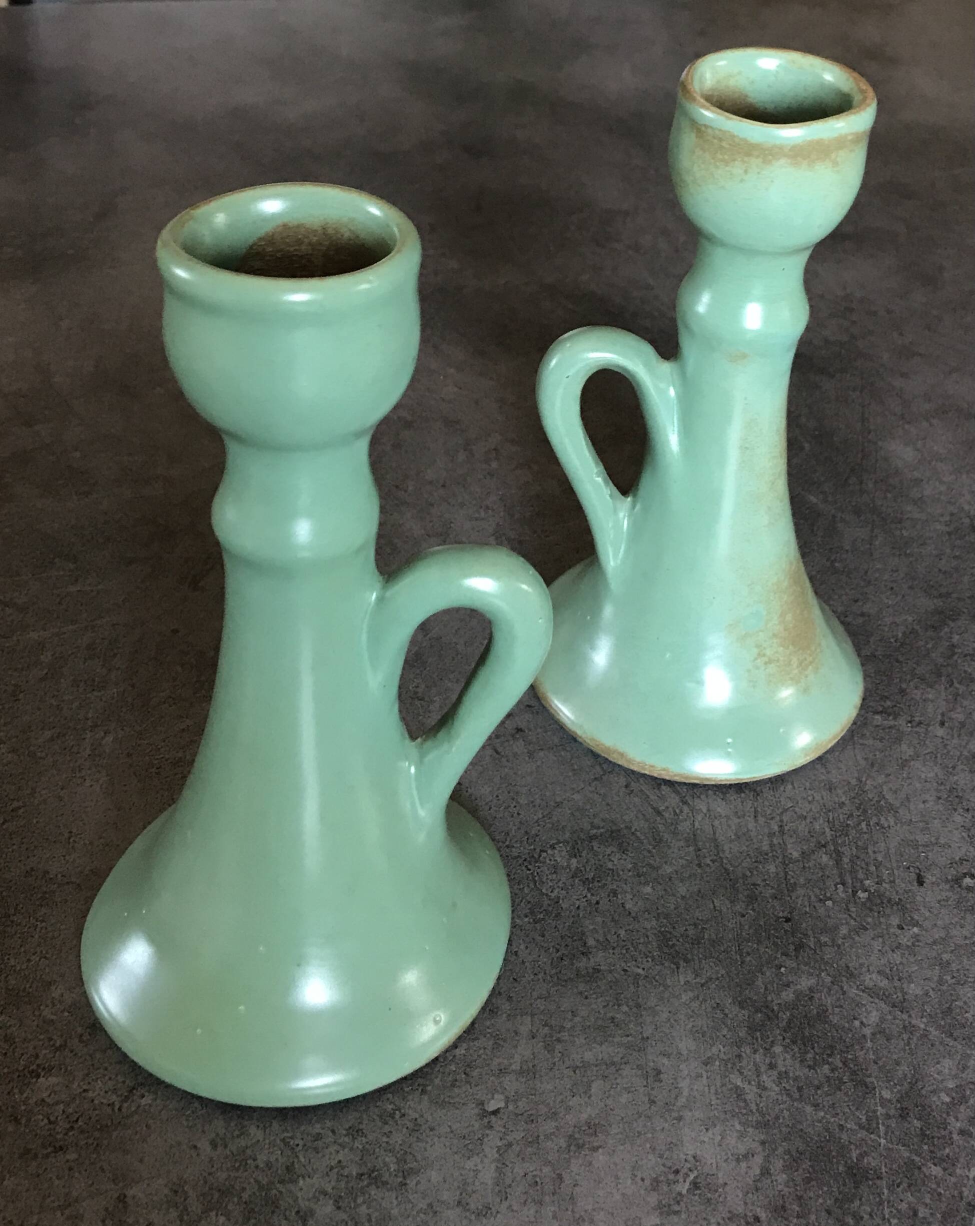 Pair of vintage table candle holders in green enameled ceramic