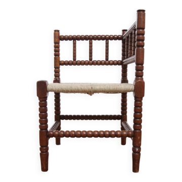 Antique Dutch oak corner chair with turned spindles and new rush seat