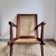 Reconstruction armchair in teak and caning