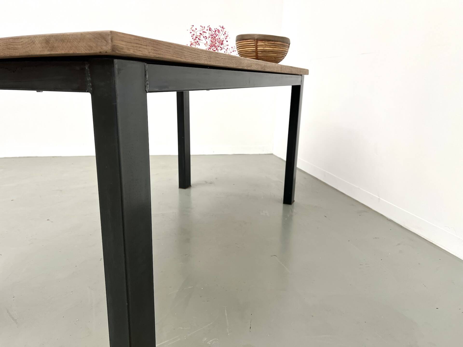 Solid oak dining table from the 70s with metal legs