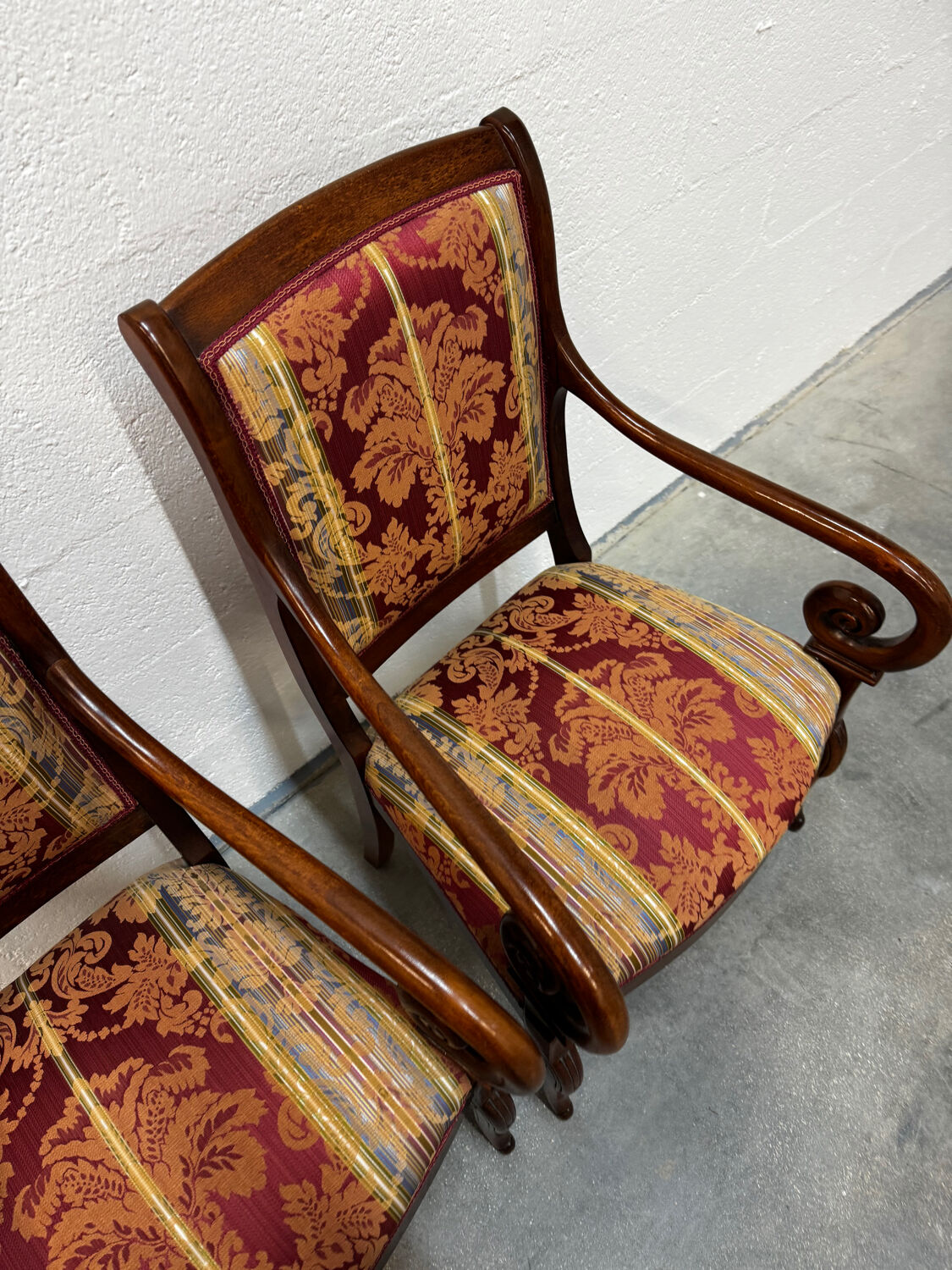 Pair of cross-back armchairs, Empire style, 19th century.