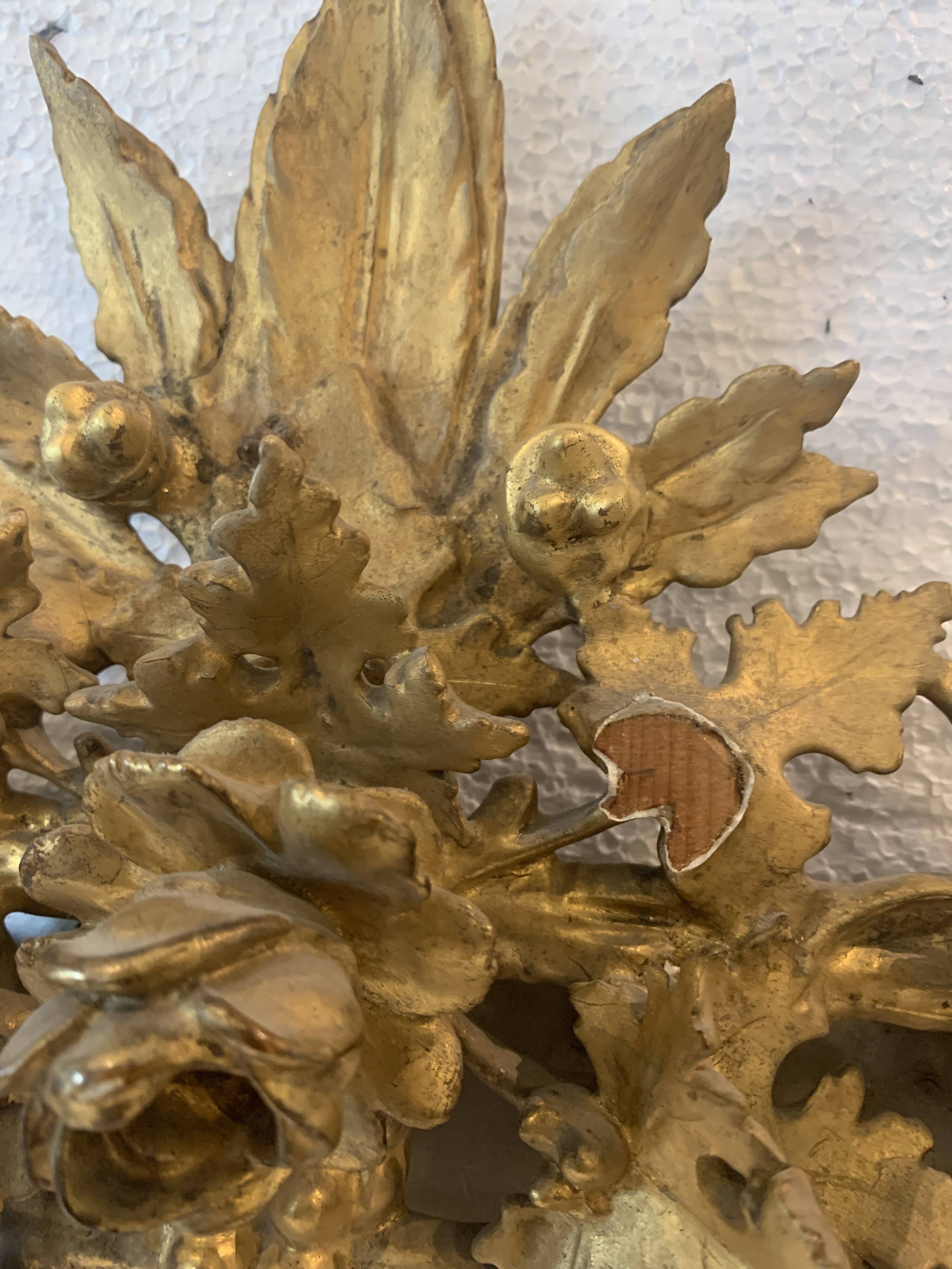 Louis XVI style mirror in carved wood and gilded with gold leaf, 19th century