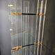 Etagère design 70 en verre plexi et laiton