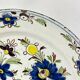 Delftware plate in white and blue with floral decoration, 18th century, Ø 36.5 cm