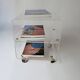 side table on wheels in plexiglass designed by David Lange 1970