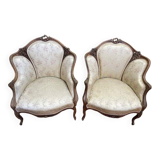 Paire de fauteuils bergères rocailles Louis XV