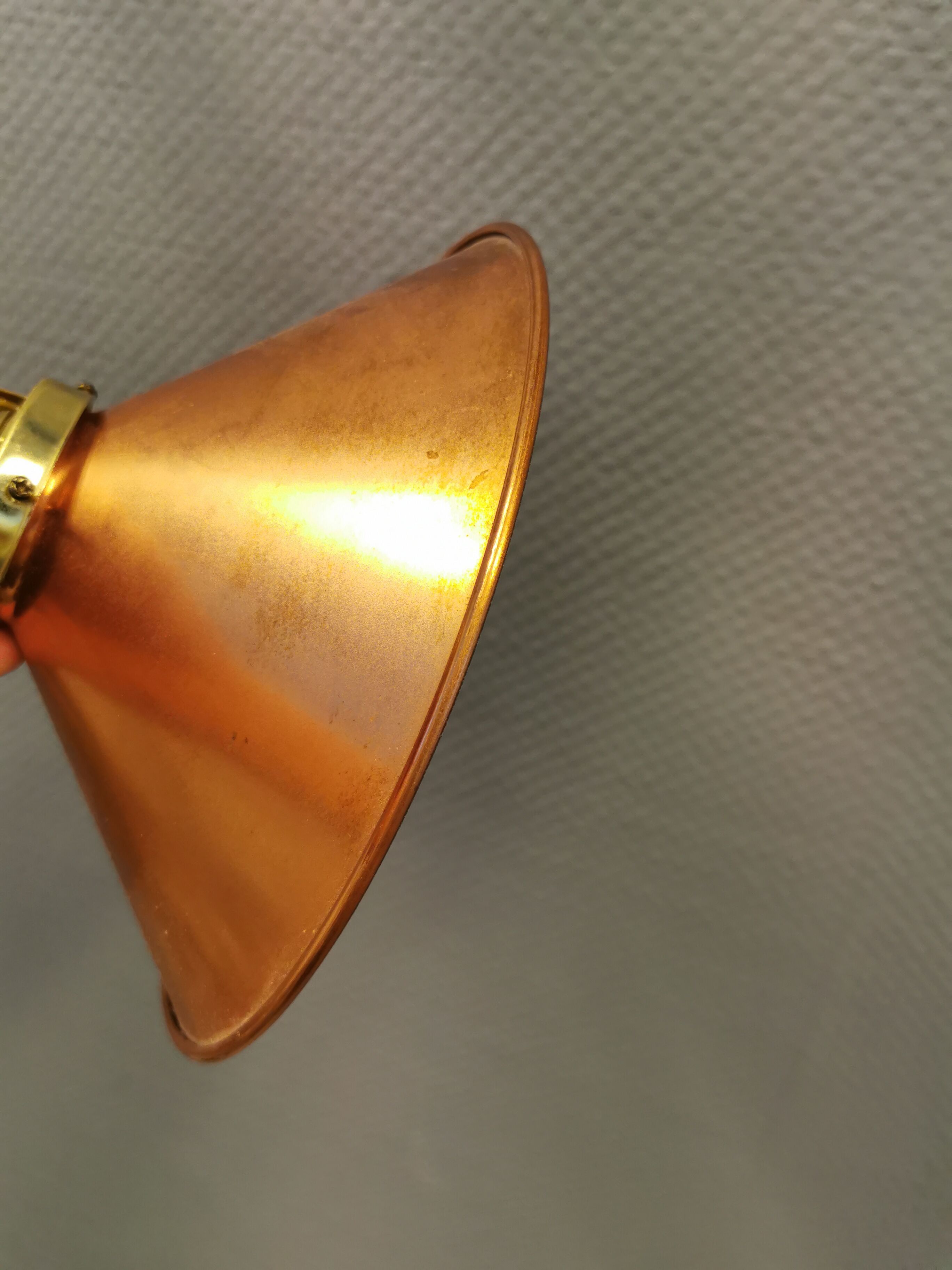 Copper hanging lamp with brass colored top and white inside lacquer.