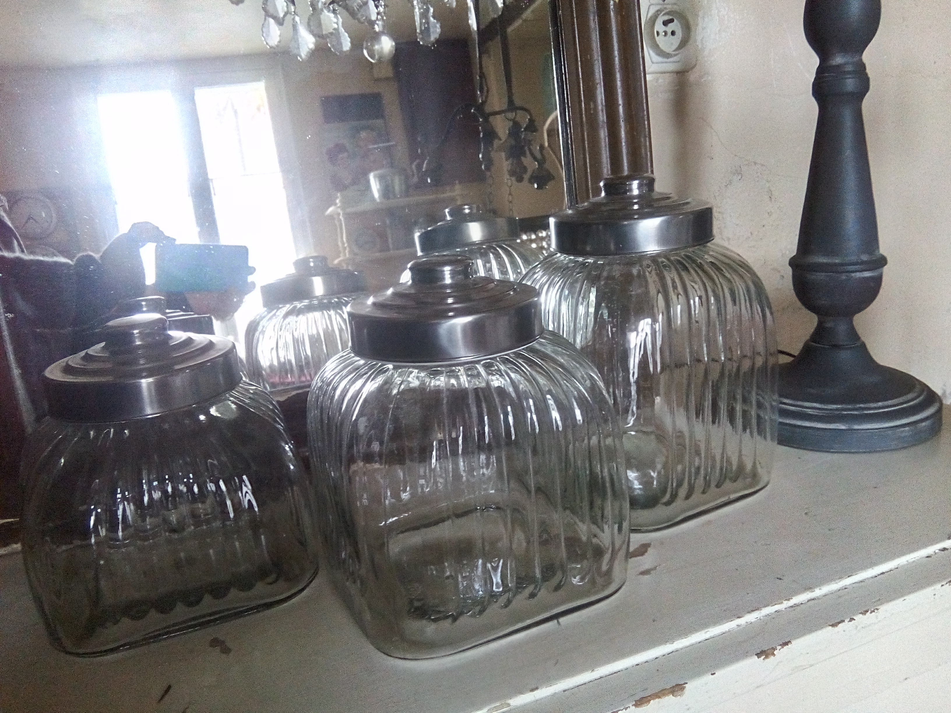 three large glass jars
