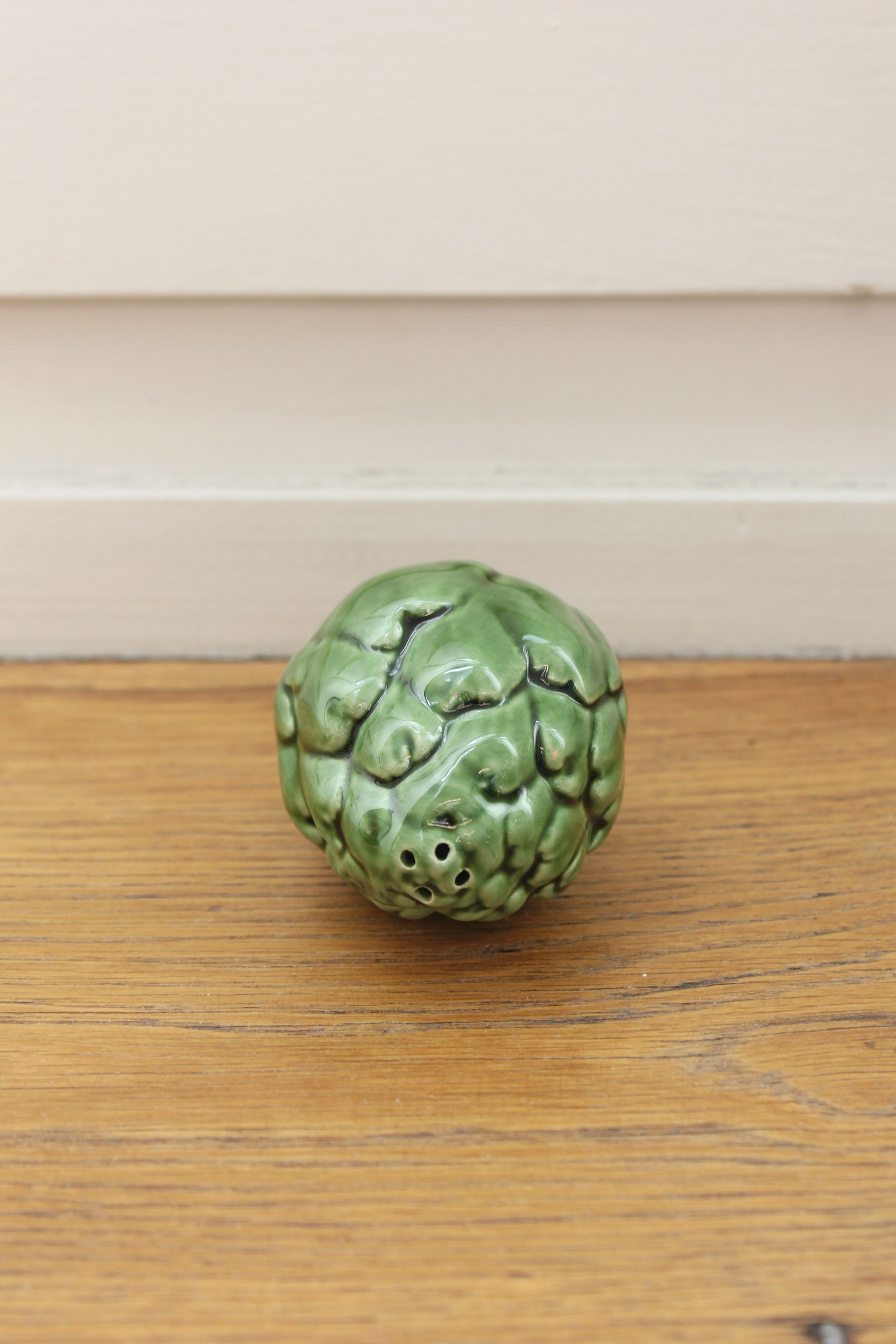 Artichoke salt shaker in vintage slurry