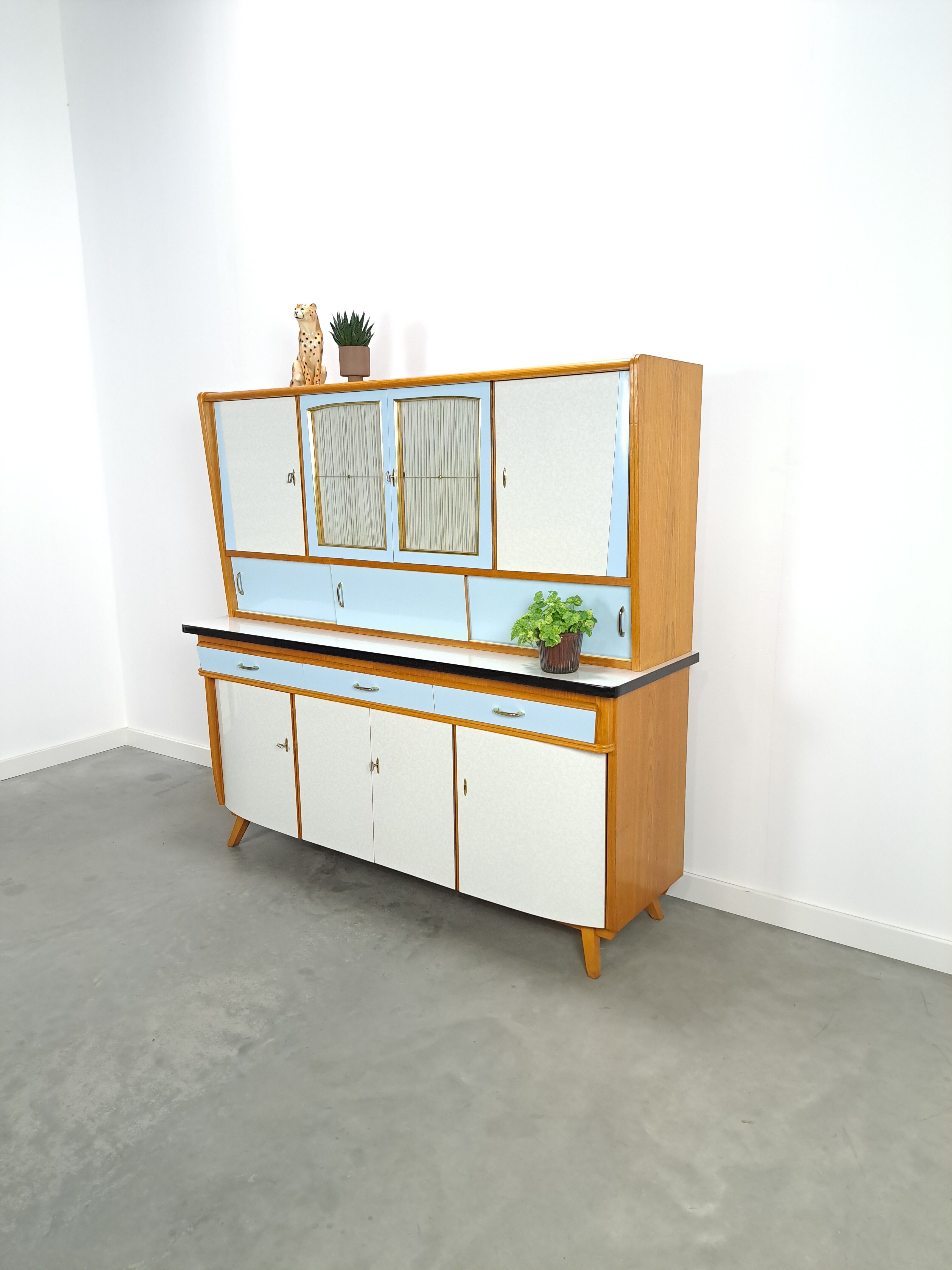 50s vintage kitchen cabinet with brass and formica