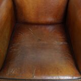 Lot de 2 chaises vintage en cuir de mouton