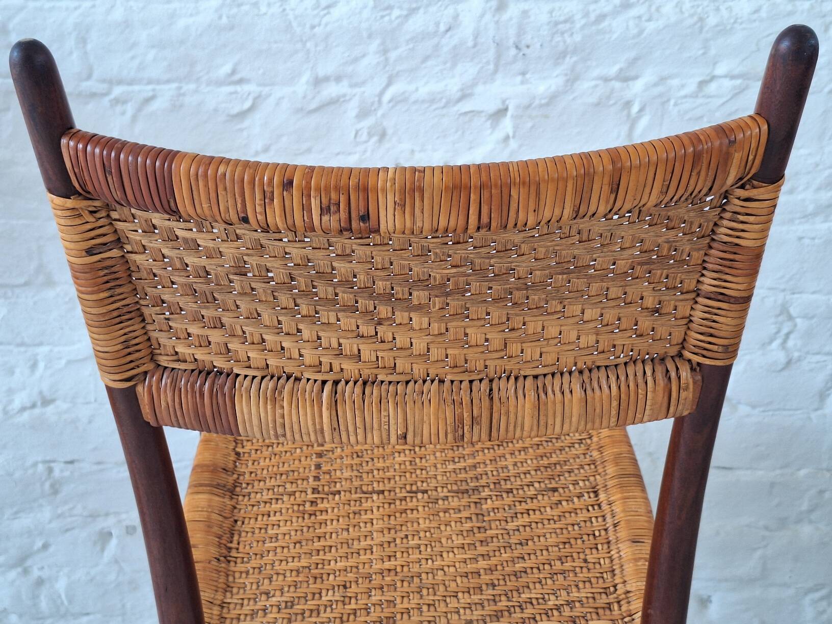 Four teak dining chairs with patinated cane after Gio Ponti, Italy 1960s