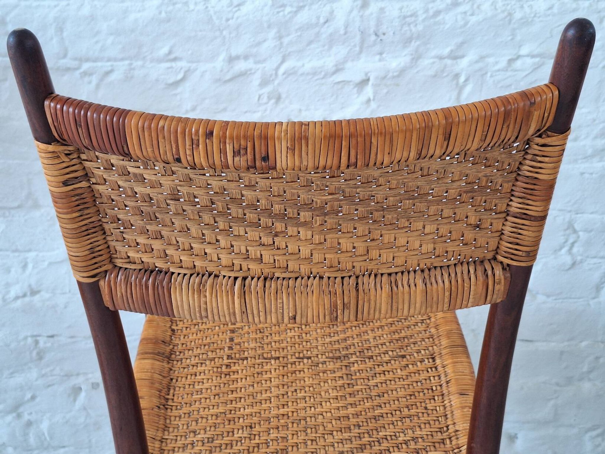 Four teak dining chairs with patinated cane after Gio Ponti, Italy 1960s