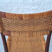 Four teak dining chairs with patinated cane after Gio Ponti, Italy 1960s