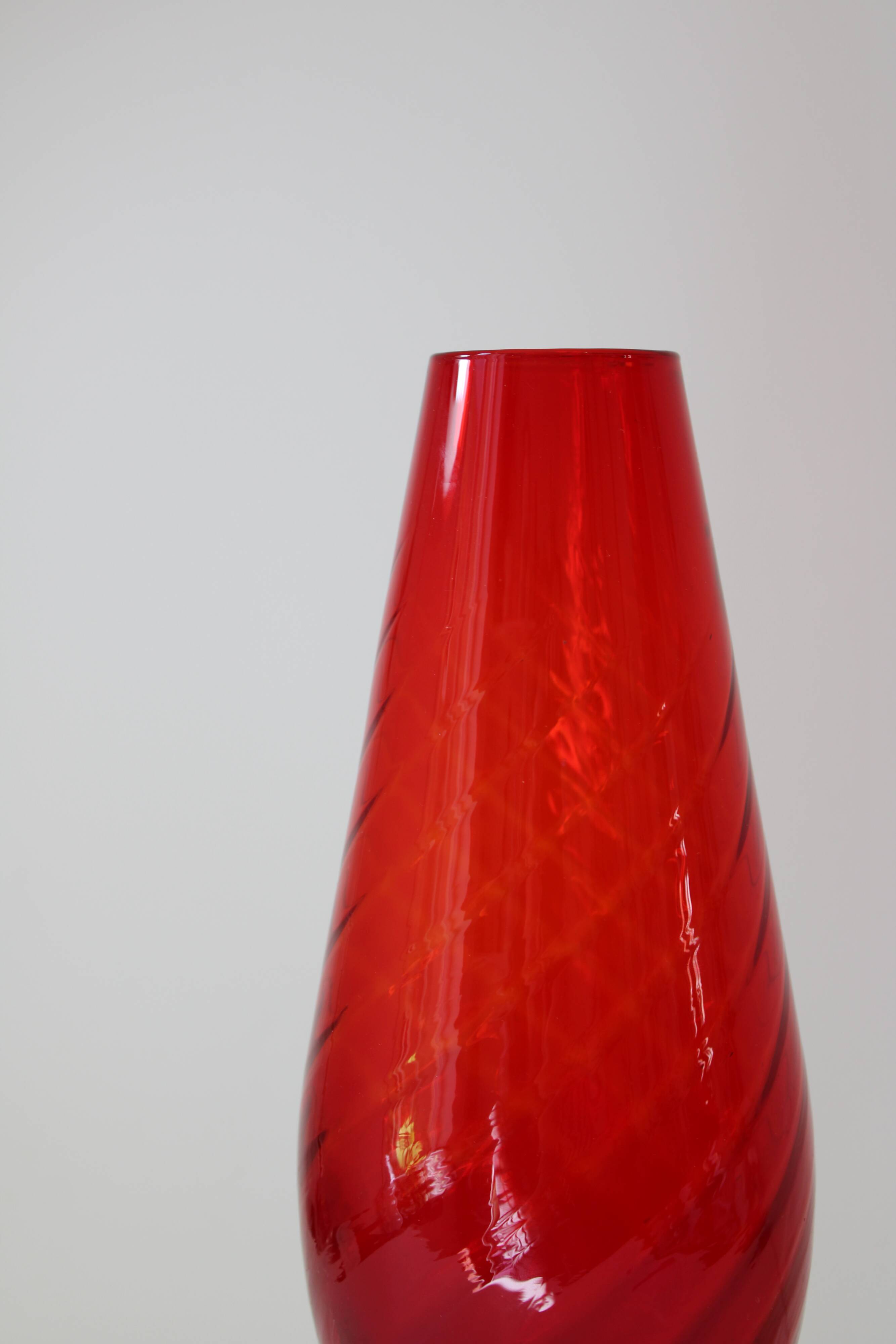 Large vintage twisted red glass vase