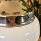 2 vintage pendant lights in white opaline with orange patterns and chrome.