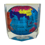 Globe paper press under resin