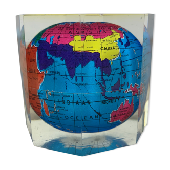 Globe paper press under resin