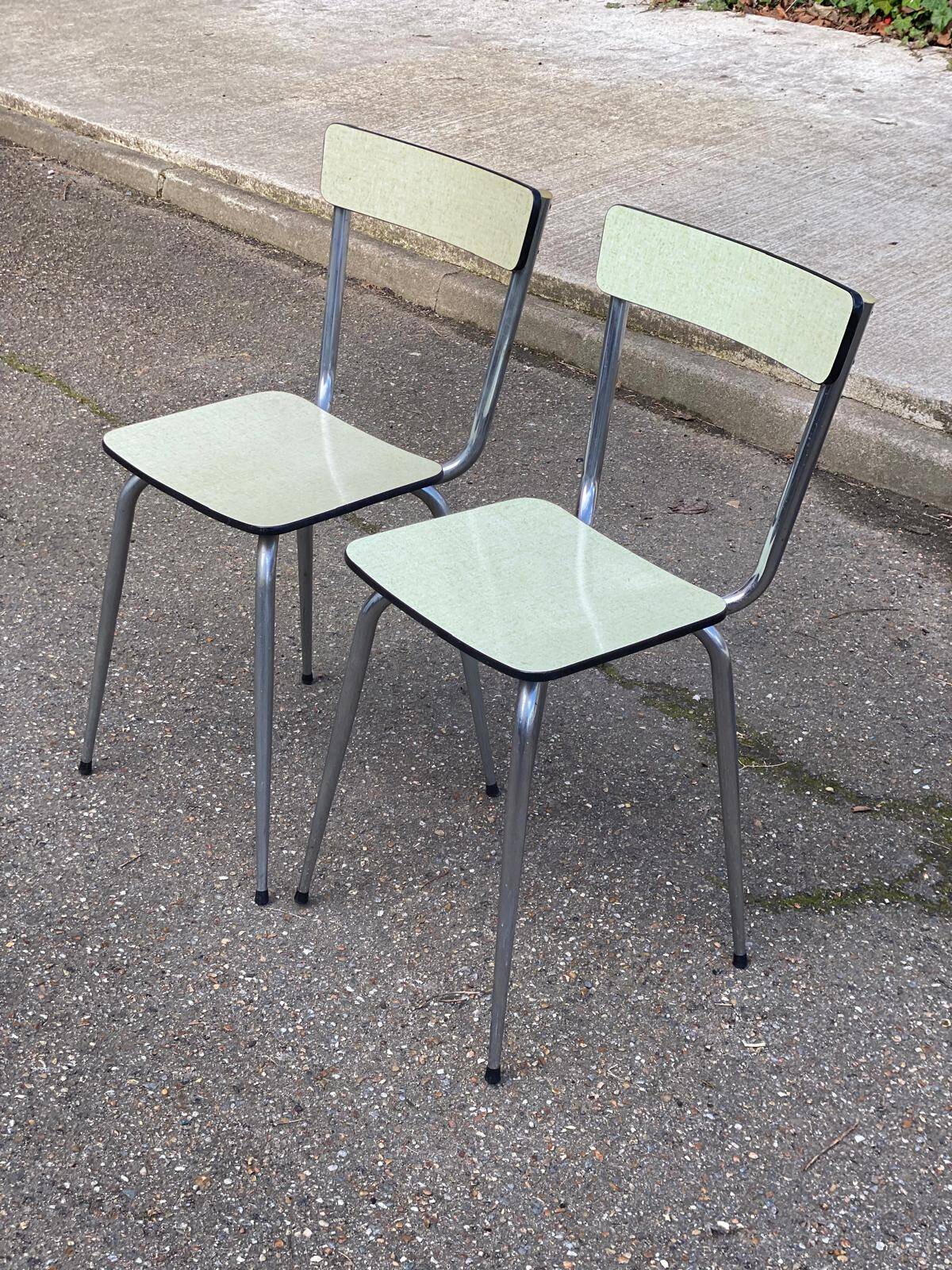 2 light green Formica and steel chairs from the 1980s.